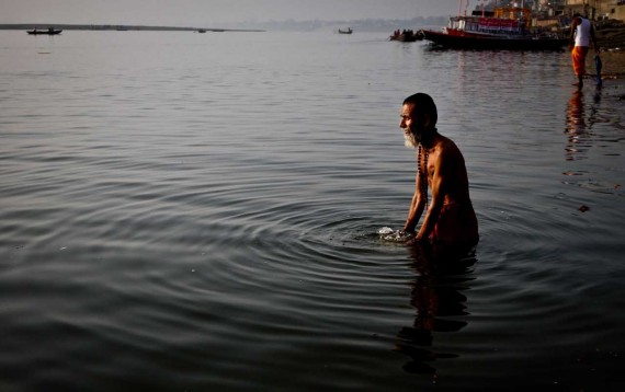 This picture of a Hindu pilgrim to the Ganges. I simply shot from a distance so to show the full context of this cleansing ritual. It is an example of showing a subject in their environment engaged in a particular activity which most people will recognize